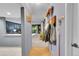 Inviting hallway connects the living area with natural light and charming decor at 14300 E Marina Dr # 109, Aurora, CO 80014