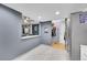 This kitchen opens to the living room, with stainless steel appliances and bright lighting at 14300 E Marina Dr # 109, Aurora, CO 80014