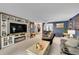 Open living room design featuring a cozy fireplace and comfortable seating area at 14300 E Marina Dr # 109, Aurora, CO 80014
