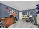 Office room with flags, many frames and awards, and storage at 14300 E Marina Dr # 109, Aurora, CO 80014