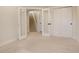 Spacious basement bedroom with double doors and access to the stairs at 5268 Talavero Pl, Parker, CO 80134