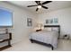 Guest bedroom with full bed, window, and neutral wall decor at 5268 Talavero Pl, Parker, CO 80134