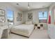 Bedroom with light walls, full bed, and window views at 5268 Talavero Pl, Parker, CO 80134