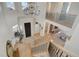 Two-story entry with chandelier and hardwood floors at 5268 Talavero Pl, Parker, CO 80134