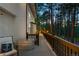 Long, private deck, perfect for relaxing and enjoying the beautiful wooded scenery at 1935 Poncha Ct, Larkspur, CO 80118