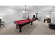 Finished basement featuring a billiard table for recreation and entertainment at 1935 Poncha Ct, Larkspur, CO 80118