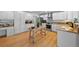 Spacious kitchen with white cabinets, stainless steel appliances, and granite countertops at 1935 Poncha Ct, Larkspur, CO 80118