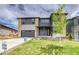 Beautiful two-story home featuring a landscaped front yard and a two-car garage at 23708 E 42Nd Ave, Aurora, CO 80019