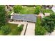 Stunning aerial view of a well-maintained home with a sprawling backyard and mature landscaping at 8455 W Belmar Ave, Lakewood, CO 80226