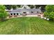 Oversized yard with patio furniture to relax and entertain guests at 8455 W Belmar Ave, Lakewood, CO 80226