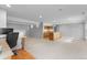 Finished basement features an open floor plan with a modern kitchenette at 7411 S Crescent Ct, Littleton, CO 80120
