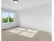 Bedroom with carpeted floor and a window view of the outdoors at 7411 S Crescent Ct, Littleton, CO 80120