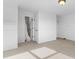 Bedroom with carpeted floors, two closets, and white walls at 7411 S Crescent Ct, Littleton, CO 80120