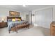 Bright primary bedroom with ensuite bathroom and walk-in closet at 7411 S Crescent Ct, Littleton, CO 80120