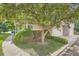 Landscaped front yard with mature trees and manicured bushes complements the exterior of this single Gathering home at 2288 S Depew St, Lakewood, CO 80227