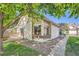 Charming single-story home with a well-maintained lawn and a peaceful, tree-shaded setting at 2288 S Depew St, Lakewood, CO 80227
