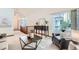 Bright and airy living room featuring high ceilings, natural light, and stylish furniture at 2288 S Depew St, Lakewood, CO 80227