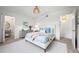 Cozy bedroom features modern decor, including comfortable bed and stylish accents at 3335 S Ammons St # 6-102, Lakewood, CO 80227