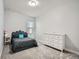Clean and inviting bedroom with a stylish upholstered bed, plush carpet, and a bright, well-lit atmosphere at 5590 W 97Th Ave, Westminster, CO 80020