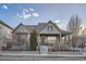 Charming home boasts a covered porch, manicured lawn, and inviting curb appeal with great landscaping at 5590 W 97Th Ave, Westminster, CO 80020