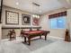 Finished basement game room with pool table, unique lighting, and fun decorations at 5590 W 97Th Ave, Westminster, CO 80020