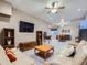 Spacious living room with plush couches, large TV, and open floor plan at 5590 W 97Th Ave, Westminster, CO 80020