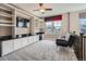 Inviting loft space with custom built-ins, ample shelving, and comfortable seating, perfect for relaxing or entertaining at 5590 W 97Th Ave, Westminster, CO 80020