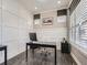 This features a clean and well-organized office space, designed for productivity with neutral tones and wooden floors at 5590 W 97Th Ave, Westminster, CO 80020