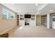 Basement with built-in shelving and natural light at 12996 Banyon Cir, Parker, CO 80134