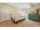 Cozy bedroom with a plush bed, soft pillows, and bright natural light at 12996 Banyon Cir, Parker, CO 80134