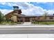 Beautiful community clubhouse with appealing architecture and landscaping at 12996 Banyon Cir, Parker, CO 80134