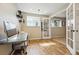 Bright home office with hardwood floors, lots of light, and modern decor at 12996 Banyon Cir, Parker, CO 80134