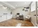 Cozy home office with natural light, wood floors, and built-in storage at 12996 Banyon Cir, Parker, CO 80134