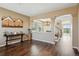 Open concept living room featuring wood floors, modern decor, and a view of the neighborhood at 12996 Banyon Cir, Parker, CO 80134