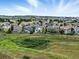 Scenic neighborhood view featuring well-maintained homes and lush greenery with a picturesque horizon at 12996 Banyon Cir, Parker, CO 80134