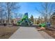 Colorful community playground with slides, swings, and climbing structures at 12996 Banyon Cir, Parker, CO 80134