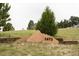 Unique sandstone address marker displaying the house number 3672 at 3672 Deer Creek Dr, Parker, CO 80138