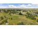 Stunning aerial view of the expansive property, surrounded by lush greenery, and beautiful homes at 3672 Deer Creek Dr, Parker, CO 80138