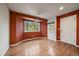Cozy dining area with ample natural light and hardwood floors at 3672 Deer Creek Dr, Parker, CO 80138