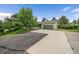 Exterior of the house showing the attached two-car garage and attractive landscaping at 3672 Deer Creek Dr, Parker, CO 80138