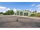 Spacious garage with multiple bays, featuring ample storage, and a large concrete driveway for easy access at 3672 Deer Creek Dr, Parker, CO 80138