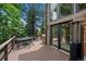 Cozy back deck, ideal for dining and relaxation, with easy access to the home's interior at 9 Red Fox Ln, Littleton, CO 80127