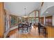 Dining area with large windows providing plenty of natural light and a beautiful view at 9 Red Fox Ln, Littleton, CO 80127