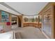 A spacious bathroom includes a tub, shower, and multiple sinks with mirrors at 9 Red Fox Ln, Littleton, CO 80127