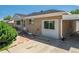 Charming brick home featuring a front door and concrete driveway on a sunny day at 10951 Rosalie Dr, Northglenn, CO 80233