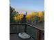 Inviting back deck featuring a comfy dog bed and a scenic view of the golden aspen trees in the fall at 11033 Barker Ave, Conifer, CO 80433