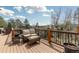 Inviting outdoor deck with plush seating and tranquil views of the surrounding natural landscape at 11033 Barker Ave, Conifer, CO 80433