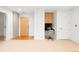 Hallway with built in desk, modern lighting, and wood door at 1700 Bassett St # 703, Denver, CO 80202