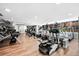 Well-equipped gym featuring treadmills and exercise machines on a hardwood floor at 1700 Bassett St # 703, Denver, CO 80202