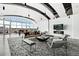 Modern lounge with comfortable seating, fireplace, large windows, and contemporary décor at 1700 Bassett St # 703, Denver, CO 80202